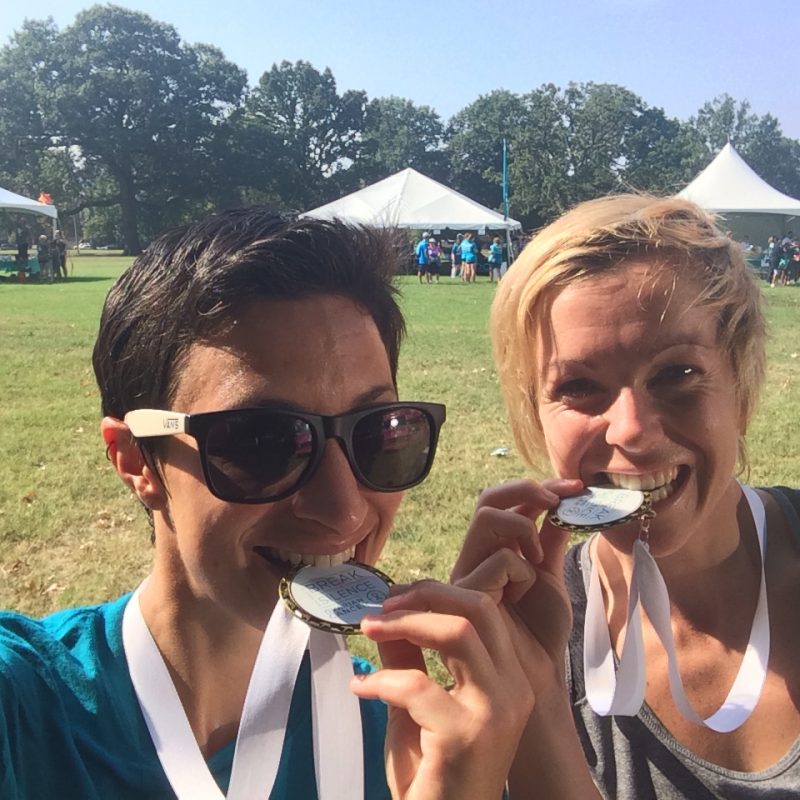 Two females bit their medals at an NOCC event